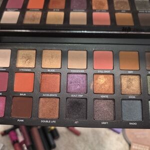 Urban Decay Eyeshadow Palette with Purple, Orange, and Gold